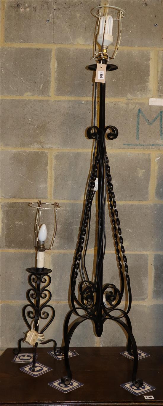 A wrought iron standard lamp, H.118cm and a table lamp